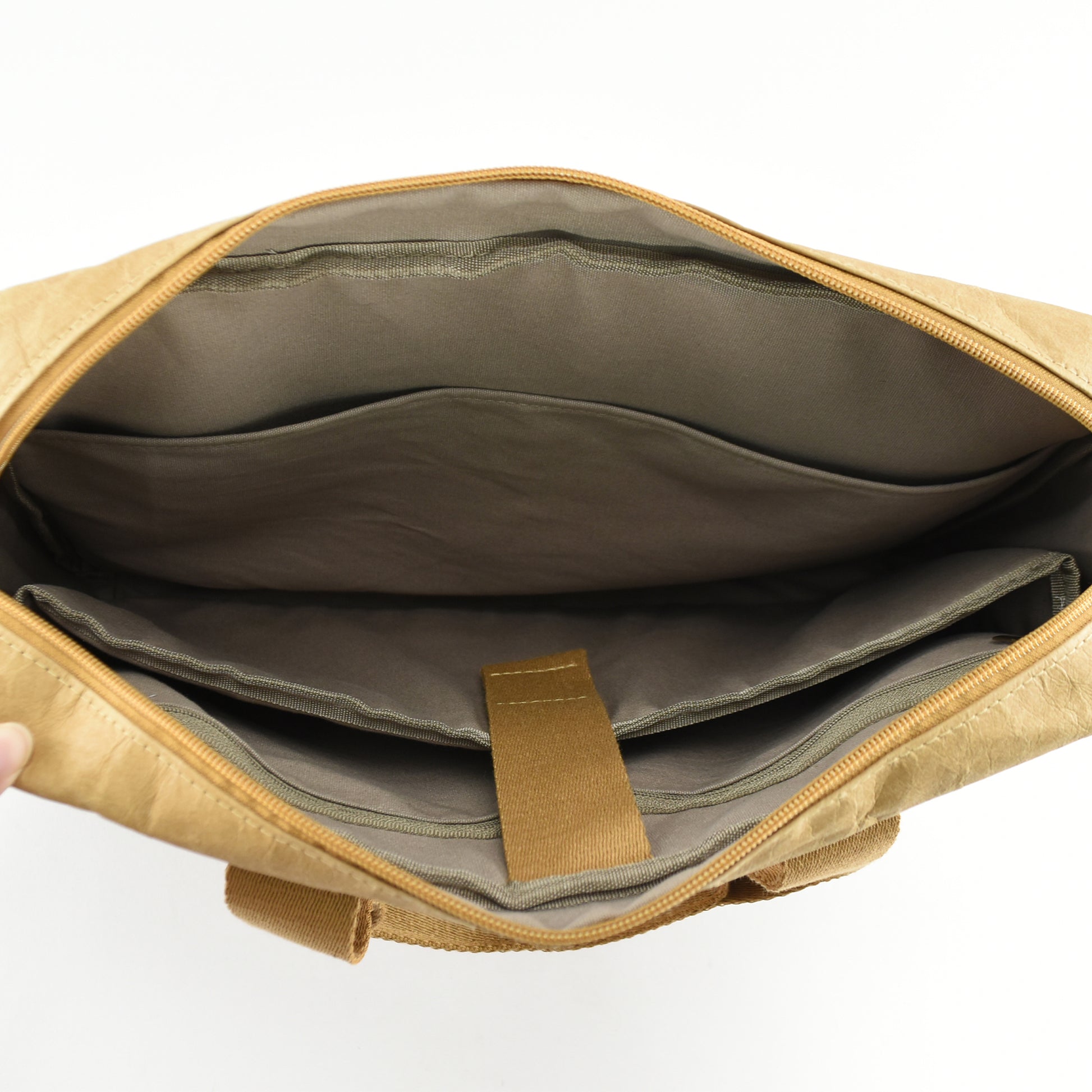 New York Kraft Paper Business Satchel shown from above, displaying the spacious interior with multiple compartments, showcasing its eco-friendly, durable design perfect for work and travel.