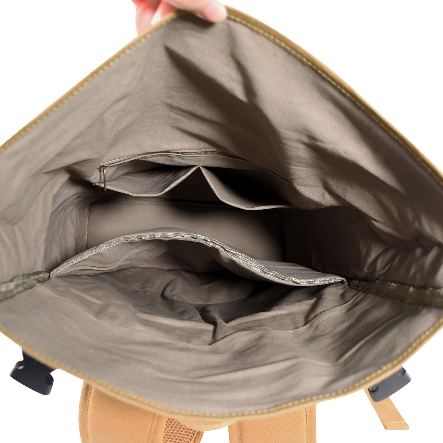 Base Kraft Paper Laptop Backpack shown open from above, revealing its well-organized interior and practical storage for everyday essentials.