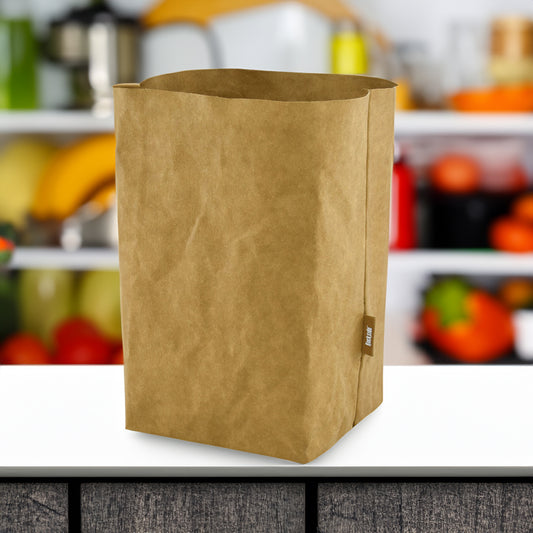 Sewo Kraft Paper Storage Bag – Extra Large shown on a kitchen bench with fresh fruit in the background, highlighting its spacious and eco-friendly design.